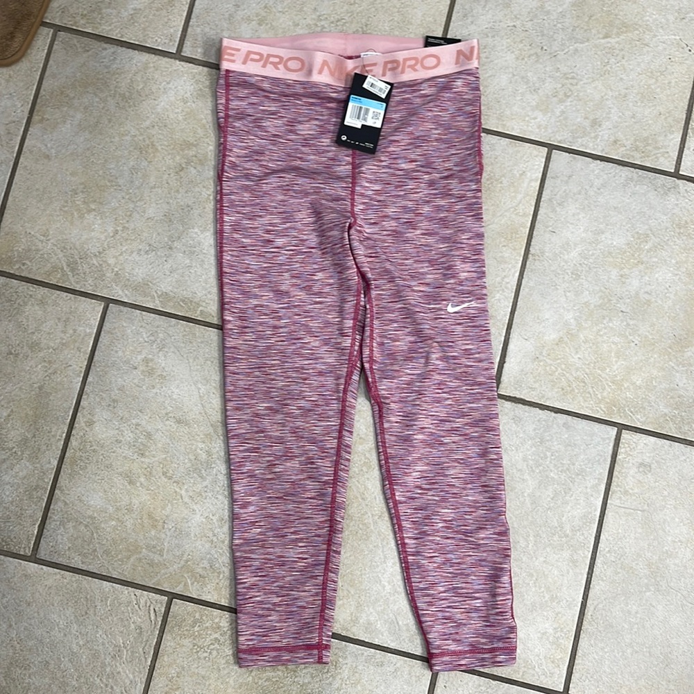 Nike pro tight fit crop, size medium. New with tag.